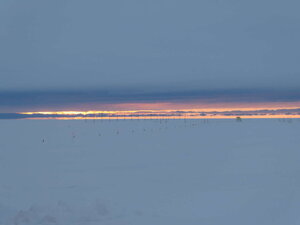 As the summer disappears, the skies get more and more moving. Here the SuperDARN array is pictured against the sky.