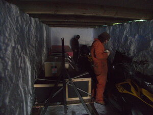 The legendary garage folk attending to the underground skidoo store, which holds a variety of equipment in a temperature controlled manner (the temperature in the ice stays does not fluctuate nearly as quickly as on the surface.)